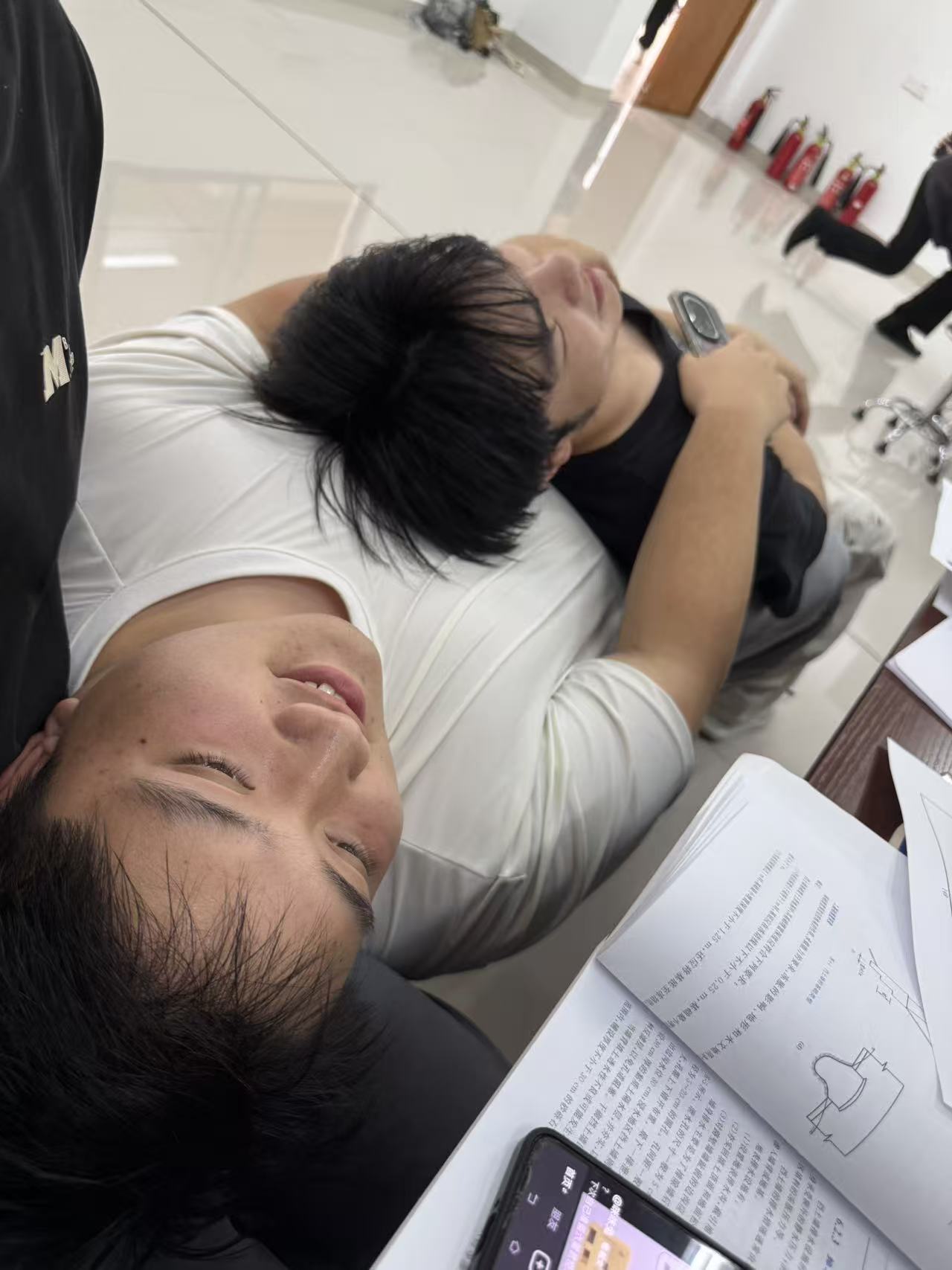 Classroom Resting At Desk Overhead